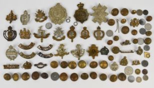 Approximately fifty cap badges and buttons including Royal Armoured Corps, Black Watch, Notts &