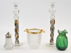 Five pieces of studio and similar glassware comprising a pair of Alistair Malcolm candlesticks