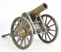 A metal model of a Spanish Mortero 1895 cannon with moving parts and 6.5 inch barrel, overall length