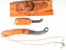 Two Royal Air Force survival knives, one with sheath, longest blade 11cm. PLEASE NOTE:- Before