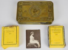 British WW1 Princess Mary's Christmas tin with cigarettes (20) together with a packet of tobacco