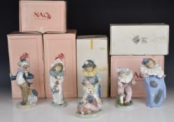 Six Nao clown figures with puppy, dove, accordion etc, all boxed, tallest 21cm