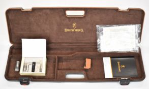 Browning shotgun case with fitted interior for an over and under shotgun, certificate, instructions,