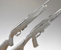 Two Crosman 1077 .177  CO2 air rifles, one with pistol grip, composite skeleton stock, adjustable