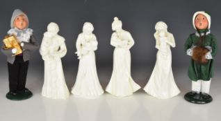 Four Royal Worcester figurines including two limited edition and two Byers Choice 'The Carolers',