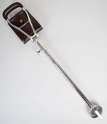 Vintage shooting stick with folding leather seat.