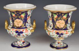 Pair of 19thC Derby pedestal Imari campana urns with serpent handles, H16cm