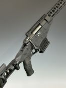 Sabatti ST-18 6.5 Creedmoor bolt-action rifle with textured pistol grip, adjustable skeleton