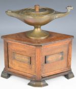 British Army WW1 TocH lamp on wooden diamond shaped memorial casket with four panels, one sliding,