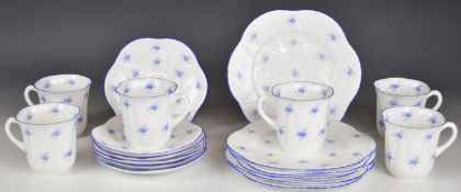 Six Shelley trios decorated with blue roses, pattern no 2148