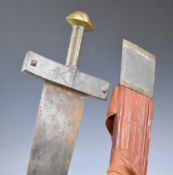 North African broadsword with 62cm blade and engraved and embossed decoration to the hilt, and