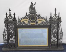 WW1 interest overmantel mirror in frame surrounded by ornate fretwork to both sides, the top with '