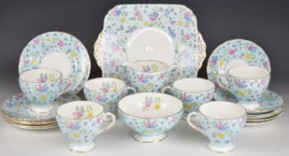Foley China six place setting tea set decorated with flowers on a pale blue ground