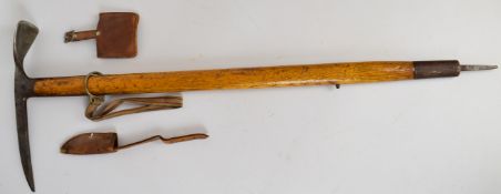 Stubai Aschenbrenner Fuhrerpickel ice axe with maker's stamps to the head, wooden shaft, serrated