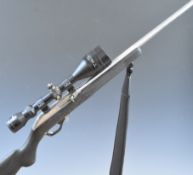 Marlin Model 995SS .22 semi-automatic rifle with composite stock, textured semi-pistol grip and