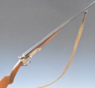 El Faisan .410 side by side hammer action folding poacher's shotgun with engraved birds to the locks