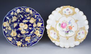 Two Meissen shallow dishes with relief moulded design and floral decoration, diameter 28cm