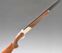 Yildiz .410 over and under assisted-opening ejector shotgun with engraved scenes of birds and dogs