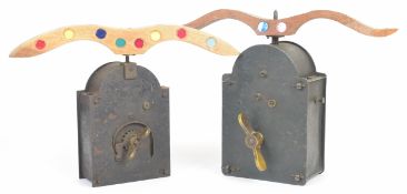 Two Victorian mechanical spinning larks lures, each with clockwork movement and mirror inset