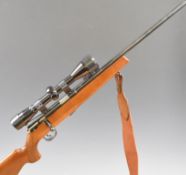 Mauser Model 107 .22 bolt-action rifle with chequered semi-pistol grip, multi-shot magazine,