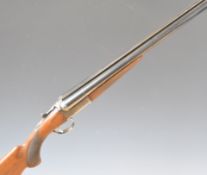 SKB Model 200E 12 bore side by side ejector shotgun with engraved lock, trigger guard, underside,