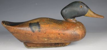 Victorian carved and painted pine shooting decoy duck with glass eyes and lead keel, 40cm long