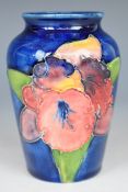 Moorcroft vase decorated in the Orchid pattern, H9cm