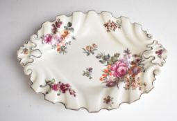 Worcester first period porcelain twin handled wrythen moulded dish with floral decoration and red