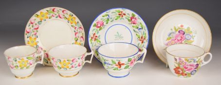 Three New Hall tea cups and saucers and an additional cup, all florally decorated