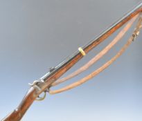 Adler .58 muzzle loading percussion hammer action gun with adjustable pop-up sights, brass trigger