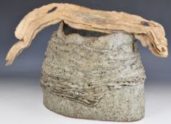 Large studio pottery vessel with driftwood handle, signed to base in pen J. Marlow, H35cm