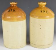 Two WW1 era stoneware rum ration jars marked SRD, one by Doulton & Co, tallest 33cm