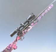 Savage Axis Muddy Girl .243 bolt-action rifle with custom composite stock, semi-pistol grip, sling