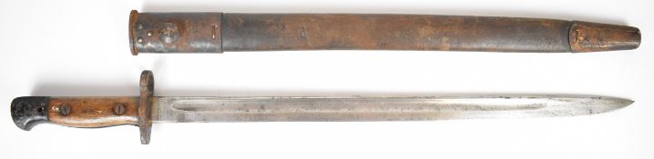 British 1907 pattern India made bayonet with R.F.I to wooden grips, W.S.C to ricasso, a 43.5cm
