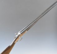 Army & Navy 12 bore side by side hammer action shotgun with named and border engraved locks,