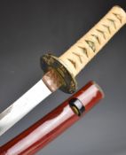 Japanese short sword with bound grip, two menuki, signed tang, decorated tsuba, 42cm curved blade