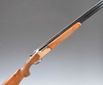 Lanber 12 bore over and under ejector shotgun with engraved birds to the locks and underside,