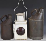 Two British Railways oil cans and a railway tail lamp, tallest 43cm