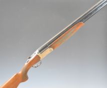 Rizzini 12 bore over and under ejector shotgun with engraved locks, trigger guard, thumb lever and
