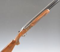 Miroku 12 bore over and under ejector shotgun with engraved locks, trigger guard, thumb lever and
