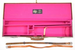 Leather bound shotgun carry case with fitted interior and 'H S Greenfield & Son Gunmakers