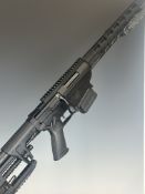 Ruger Precision .308 Win bolt-action rifle with textured pistol grip, fully adjustable stock, two