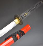 Japanese Samurai sword with bound grip, two menuki, decorated tsuba, 70cm curved fullered blade,