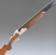 Beretta Model S687 12 bore over and under ejector shotgun with engraved scenes of birds to the locks