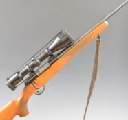 Sako M591 .243 bolt-action rifle with chequered semi-pistol grip and forend, raised cheek piece,