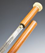Spanish swordstick with octagonal ivory finial and 29.5 inch fullered blade with etched decoration