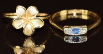 An 18ct gold ring set with a sapphire and diamonds in a platinum setting (2.1g, size P) and a 14k