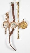 Three 9ct gold watches comprising two ladies examples, one on brown leather strap and one on 9ct