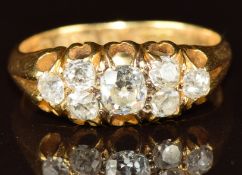 Victorian 18ct gold ring set with old cut diamonds, the centre diamond approximately 0.3ct,