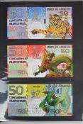 Collection of approximately 220 world banknotes in an album, including Russia, Mongolia, Madagascar,